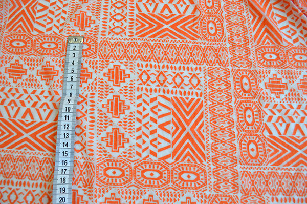 Stof half transparante tricot oranje